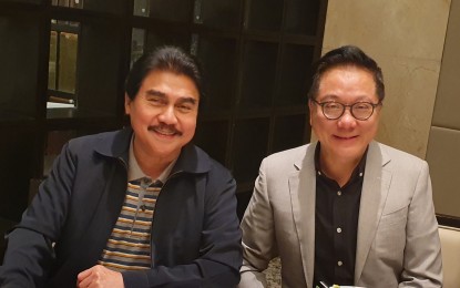 <p><strong>ADOPTED SON.</strong> Bacolod City Mayor Evelio Leonardia (left) meets with tycoon Andrew L. Tan, chairman of conglomerate Alliance Global Group Inc., at the Marriott Hotel in Manila recently. Tan will be conferred by the city government, together with the Bacolaodiat Foundation, the titles 'Adopted Son of Bacolod' and 'Honorary Mayor of Bacolod City' during the celebration of the 15th Bacolaodiat Festival on February 1. <em>(Photo courtesy of Bacolod City PIO)</em></p>