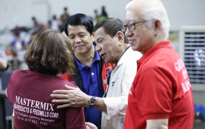 <p><strong>BATANGAS VISIT.</strong> President Rodrigo Roa Duterte comforts one of the victims affected by the Taal Volcano eruption during his visit at the Batangas City Sports Coliseum on January 14, 2020. Duterte was “very happy” with how government agencies responded to the eruption of Taal Volcano. <em>(Presidential photo by Ace Morandante)</em></p>