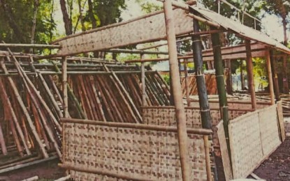 <p><strong>KIOSKS MADE OF BAMBOO.</strong> "Bahay Kubo" inspired food kiosks will be used during the three-day Ilonggo Food Festival starting January 24. The kiosks are being prepared by the town of Maasin, the bamboo capital of the Philippines. <em>(PNA photo by IFFI)</em></p>