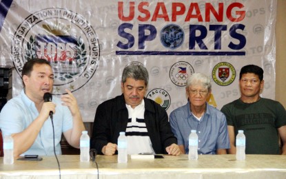 <p><strong>READY TO HELP</strong>. Games and Amusement Board chairman Abraham Kahlil Baham Mitra (left) assures support to former world boxing champion Luisito Espino (right) during the Tabloids Organization in Philippine Sports (TOPS) forum at the National Press Club in Intramuros, Manila on Thursday (Jan. 16, 2020). Espinosa sought assistance for some uncollected prize money owed to him by the promoters of his previous title fight in Koronadal, Cotabato. Also in photo are TOPS President Ed Andaya (2nd from left) and former boxing champion Erbito Salavarria. <em>(PNA photo by Jess M. Escaros Jr.)</em></p>