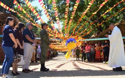 <p><strong>50TH ANNIVERSARY.</strong> A Philippine Army chaplain says a prayer before the ribbon-cutting that signals the opening of the Army's 4th Infantry Division’s 50th founding anniversary celebration at Camp Edilberto Evangelista in Cagayan de Oro City on Wednesday, Jan. 15. In the photo are (from left) Marie Elaine Unchuan, Department of Tourism-10 director; Mylah Faye Aurora Cariño, National Economic Development Authority-10 director; Cagayan de Oro City Mayor Oscar Moreno; and Maj. Gen. Franco Nemesio Gacal, 4ID commander. <em>(PNA photo by Jigger J. Jerusalem)</em></p>