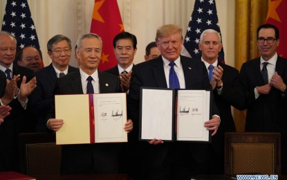 <p><strong>US-CHINA TRADE DEAL.</strong> US President Donald Trump and Chinese Vice Premier Liu He show the signed China-US phase-one economic and trade agreement during a ceremony at the East Room of the White House in Washington D.C., the United States on Jan. 15, 2020. Liu is also a member of the Political Bureau of the Communist Party of China Central Committee and chief of the Chinese side of the China-U.S. comprehensive economic dialogue. <em>(Photo by Xinhua/Wang Ying)</em></p>