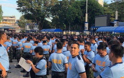 <p><strong>READY FOR DEPLOYMENT.</strong> Police officers belonging to the Reactionary Standby Support Force (RSSF) hold a formation in a send-off ceremony at Camp Crame, Quezon City on Friday (Jan. 17, 2020). The police officers will be deployed to areas in Cavite and Batangas that are affected by the eruption of Taal Volcano.<em> (PNA photo by Lloyd Caliwan)</em></p>