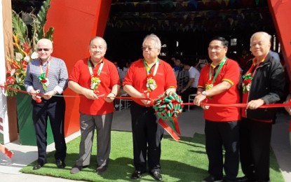 <p><strong>CEMENT AND PORT FACILITIES.</strong> Ambassador Jose Cuisia (extreme left), PHINMA president and CEO Ramon del Rosario (3rd from left), PhilCement president and CEO Eduardo Sahagun (4th from left) and other officials cut the ceremonial ribbon signaling the operation of the cement and port facilities in Mariveles, Bataan on Saturday (Jan. 18, 2020). The cement and port facilities that sit in 1.9 hectares of land have total investment of PHP1 billion. <em>(Photo by Ernie Esconde)</em></p>
