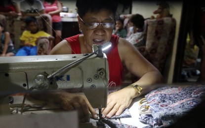 <p><strong>FREE FACE MASKS</strong>. A 61-year-old seamstress Rosalina Mantuano of Lipa City, Batangas sews thousands of face masks for the evacuees affected by the Taal Volcano eruption. Mantuano plans to make more face masks and give these for free to her kababayans until the volcano calms down. <em>(PNA photo by Joey Razon)</em></p>