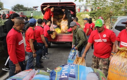 <p><strong>RELIEF OPERATIONS.</strong> The team from Taguig City unloads relief packs for victims of the Taal Volcano eruption in an evacuation site in Laurel, Batangas on Jan. 17, 2020. The city also held a medical mission for 122 families or 500 individuals. <em>(Photo courtesy of Mylene Gregorio)</em></p>