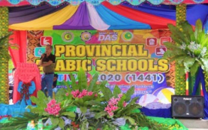 <p><strong>ARABIC SCHOOLS FEST.</strong> An Arabic school teacher speaks during the opening of the Maguindanao Provincial Arabic Schools Festival at Barangay Old Maganoy, Datu Abdullah Sangki, Maguindanao on Saturday (Jan.18, 2020). The annual festival aims to advance the advocacy in strengthening Madaris schools in Maguindanao.<em> (Photo courtesy of 2MIB)</em></p>