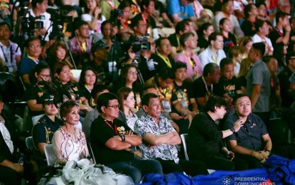 <p><strong>DUTERTE IN CEBU</strong>. President Rodrigo Duterte sits next to Cebu City Mayor Edgardo Labella (2nd from left) and Cebu Governor Gwendolyn Garcia while watching the Sinulog dance performance of the Lumad Basakanon at the Cebu City Sports Center Grandstand on Sunday (Jan. 19, 2020). In his short speech, Duterte singled out for the second time the City of Talisay where illegal drugs continue to proliferate. <em>(Presidential photo by Rey Baniquet)</em></p>