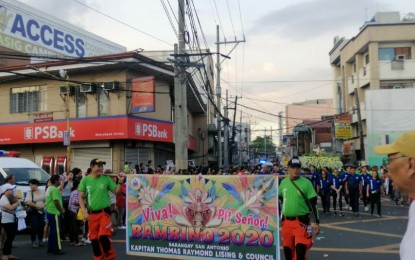 <p><strong>BAMBINO FEST</strong>. Devotees of the Sto. Niño or the Child Jesus join the parade of the 19th Bambino Festival in Pasig City on Sunday. Around 6,000 devotees participated in the event. <em>(Barangay San Antonio photo)</em></p>