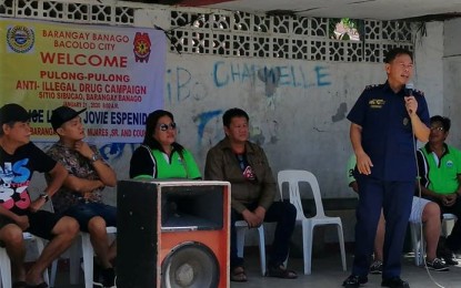 <p><strong>TALKING TO THE VILLAGERS.</strong> Lt. Col. Jovie Espenido, chief of Bacolod City Police Office Drug Enforcement Unit, gives a lecture to residents of Sitio Sibucao in Barangay Banago after conducting a buy-bust that led to the arrest of three suspects on Tuesday (Jan. 21, 2020). Also present were barangay officials led by village chief Ricky Mijares. <em>(Photo courtesy of Bacolod City Police Office)</em></p>