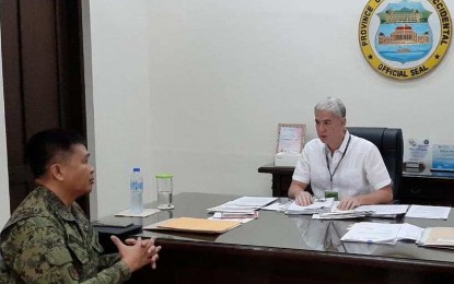 <p><strong>COURTESY CALL.</strong> Col. Inocencio Pasaporte, commander of the Philippine Army’s 303rd Infantry Brigade, paid a courtesy call on Negros Occidental Governor Eugenio Jose Lacson at the Provincial Capitol in Bacolod City on Monday (Jan.20, 2020). The Army official assured Lacson of the military’s support in maintaining peace and sustaining development in the province. <em>(Photo courtesy of 303rd Infantry Brigade, Philippine Army)</em></p>