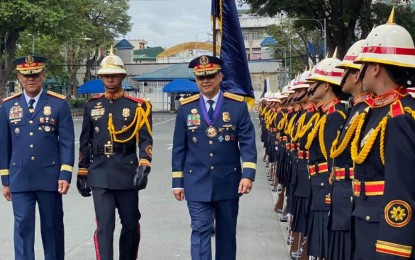 <p><strong>NEW PNP CHIEF.</strong> Newly-installed PNP chief, Gen. Archie Gamboa (center) is given arrival honors at Camp Crame on Tuesday (Jan. 21, 2020). On his first day as the 23rd PNP head, Gamboa ordered police officers to apply work simplification methods to accomplish more tasks. <em>(PNA photo by Lloyd Caliwan)</em></p>