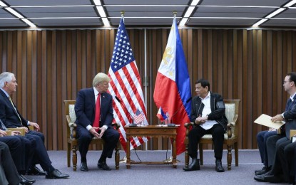 <p><strong>TRUMP’S INVITE</strong>. President Rodrigo Roa Duterte and US President Donald Trump discuss matters during a bilateral meeting at the Philippine International Convention Center in Pasay City on November 13, 2017. Malacañang on Thursday (Jan. 23, 2020) said Duterte is carefully weighing Trump’s invitation to attend a summit in Las Vegas in March this year. <em>(Presidential photo by Karl Normal Alonzo)</em></p>