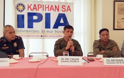 <p><strong>FIGHTING INSURGENCY</strong>. Maj. Miguel Andeza, OIC operations officer of the Negros Oriental Provincial Police Office, Col. Noel Baluyan, commander, 302nd Brigade of the Philippine Army, and Lt. Col. Randy Pagunuran, commander of the 94th Infantry Battalion of the Philippine Army (from left to right), are shown during the "Kapihan sa PIA forum" in Dumaguete City on Wednesday, Jan. 22, 2020. Baluyan said he is optimistic that the Negros Oriental Task Force to End Local Communist Armed Conflict (NOTF-ELCAC) will be able to achieve its goals on or before the deadline set by President Rodrigo Duterte. <em>(Photo by Judy Flores Partlow)</em></p>