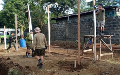 <p><strong>ENSURING SANITATION.</strong> Troops from the Philippine Air Force's 355th Aviation Engineer Wing build latrines for evacuees in Sto. Tomas Batangas on Jan. 19, 2020. These temporary latrines will be replicated in other evacuation centers to help ensure sanitation.<em> (Photo courtesy of Air Force Public Affairs Office)</em></p>