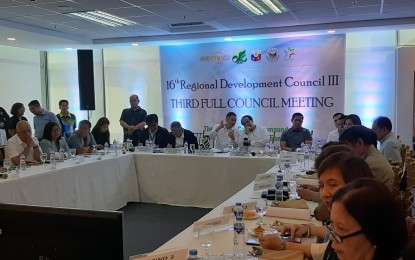 <p><strong>REGIONAL DEV'T COUNCIL.</strong> Bataan Governor Albert Garcia (seated at the center), chairperson of the Regional Development Council-3, presides over the 16th RDC Central Luzon Full Council meeting in Balanga City, Bataan on Wednesday (Jan. 22, 2020). RDC-3 is pushing for the construction of Bataan–Cavite Interlink Bridge.<em> (Photo by Ernie Esconde)</em></p>