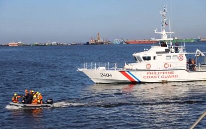 <p><strong>STRICT CHECK.</strong> A rigid hull inflatable boat and patrol vessel of the Philippine Coast Guard (PCG) in waters off the coast of Manila. PCG Commandant, Adm. Joel Garcia on Friday (Jan. 24, 2020) ordered an intensified inspection of all foreign vessels amid the threat of a possible outbreak of the novel coronavirus that originated from Wuhan, China. <em>(Photo courtesy of PCG)</em></p>