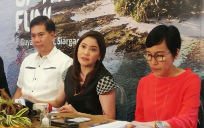 <p><strong>SAFE FOR TRAVEL.</strong> Tourism Secretary Bernadette Romulo-Puyat (center), together with Undersecretary Benito Bengzon Jr. (left) and Assistant Secretary Maria Rica Bueno (right), says the country remains a safe travel destination amid the 2019 novel coronavirus scare (nCoV), in a press conference in Makati City on Friday (Jan. 24, 2020). The Civil Aeronautics Board has earlier suspended the flights between parts of the country and Wuhan City in central China, the place of origin of the 2019-nCoV. <em>(PNA photo by Joyce Ann L. Rocamora)</em></p>