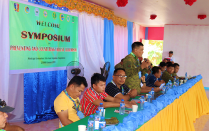 <p><strong>ISLAM IS PEACE.</strong> Lt. Col. Edwin Alburo, chief of the 57th Infantry Battalion, stresses a point during the Symposium on Preventing and Countering Violent Extremism at the municipal gymnasium in Datu Saudi Ampatuan, Maguindanao on Sunday (Jan. 26, 2020). The 57IB vows to actively join in upcoming anti-terrorism symposiums in its area of responsibility in the province to educate locals on rejecting attempts of recruitment by local terrorist groups and shun the practice of violent extremism. <em>(Photo courtesy of 57IB)</em></p>