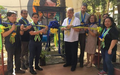 <p><strong>WATER SENSORS</strong>. National Water Resources Board (NWRB) Director Sevillo David Jr. and Science and Technology Secretary Fortunato De la Peña (3rd and 4th from left) cut the ribbon during the installation of telemetry sensors for water quality monitoring at Pavia National High School in Pavia, Iloilo on Monday (Jan. 27, 2020). The system allows for the remote management of groundwater resources to improve the monitoring and management capabilities of the NWRB.<em> (PNA Photo by Perla G. Lena)</em></p>