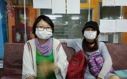 <p><strong>VISA EXTENSION.</strong> Chinese nationals Chen Bei (left) and her mother Zou Qin are seeking visa extension from the Bureau of Immigration in Negros Oriental amid public fear of the novel coronavirus which originated in Wuhan, China. The two arrived in Dumaguete on Jan. 10 and are scheduled to depart February 6. <em>(Photo by Judy Flores Partlow)</em></p>