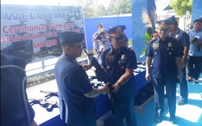 <p><strong>NEW WEAPONS.</strong> Philippine National Police (PNP) chief, Gen. Archie Gamboa, turns over 133 basic assault rifles to the Cagayan Valley police through Brig. Gen. Angelito Casimiro, regional police director, at the Camp Marcelo Adduru in Tuguegarao City on Wednesday, Jan. 29, 2020. Gamboa said he wanted improved anti-drug police operations with more focus on high-value targets. <em>(Photo courtesy of PRO-2)</em></p>