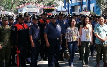 <p><strong>SECURITY FOR BACOLAODIAT.</strong> Col. Henry Biñas (center), city police director, with Bacolaodiat Festival 2020 chair Oddette Ong-Gomez (2nd from right), leads the send-off of troops and resources for the 15th Bacolaodiat Festival, in a ceremony held at the Bacolod City Police grounds on Thursday afternoon (Jan. 30. 2020). The three-day festival will be held from January 31 to February 2 in two venues -- the Bacolod City Government Center and the Lacson Tourism Strip. <em>(PNA photo by Nanette L. Guadalquiver)</em></p>