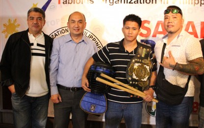 <p><strong>CHAMPION.</strong>  Juego Todo's first national champion Genil Francisco (2nd from right) poses with Underground Battle Mixed Martial Arts founder Ferdie Munsayac (right) during the weekly TOPS sports forum at the National Press Club in Intramuros, Manila on Thursday (Jan. 30, 2020).  Francisco received the title of his new house and lot, his prize as champion, from Balai Cagayano chief operating officer Vergel Glorioso (2nd from left), with TOPS president Ed Andaya of People's Tonight.  <em>(PNA photo by Jess M. Escaros Jr.)</em></p>