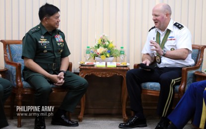 <p><strong>IMPROVING TIES.</strong> Army commander Lt. Gen. Gilbert Gapay (left) and United States Army Pacific deputy commanding general Maj. Gen. John Johnson (right) exchange pleasantries on the sidelines of the 8th Executive Steering Group Meeting on in Fort Bonifacio, Taguig City on Wednesday (Jan. 29, 2020). During the meeting, the two armies discussed ways to further improve defense capabilities. <em>(Photo courtesy of Army Chief Public Affairs Office)</em></p>