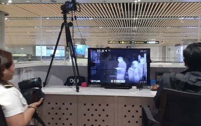 <p><strong>CLOSE MONITORING</strong>. Quarantine personnel intensify monitoring the health condition of arriving passengers at the Mactan-Cebu International Airport through thermal cameras. Vice Mayor Michael Rama on Thursday (Jan. 30, 2020) announced the creation of the Cebu City Council Task Force Coronavirus that will deal with the deadly virus, as the DOH confirmed that a nCoV patient is currently confined in the city. <em>(PNA file photo)</em></p>