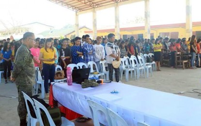 <p><strong>RAISING AWARENESS.</strong> Lt. Col. Francisco L. Molina, Jr., commander of the Army's 23rd  Infantry Battalion (standing in front) leads an information drive against the recruitment effort of the communist New People's Army on Friday (January 31) in Buenavista, Agusan del Norte. The event was participated by more than 600 students in the area. <em>(Photo courtesy of the 23IB)</em></p>