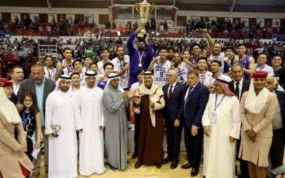 <p><strong>CHAMPION</strong>. Renaldo Balkman hoists the championship trophy of the Dubai International Basketball Championship after Mighty Sports won the title at the Shabab Al Ahli Club on Saturday (Feb. 2, 2020). Balkman was named the most valuable player. <em>(Photo courtesy of Shoot News)</em></p>