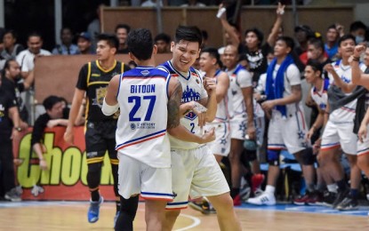 <p><strong>ALL SMILES.</strong> Cris Bitoon and Carlo Lastimosa celebrate after Manila converted on a play. The Manila Stars put an end to Bacoor City Strikers' eight-game winning streak in the Maharlika Pilipinas Basketball League Lakan Season with a 78-74 road win at the STRIKE Gym in Bacoor on Monday night (Feb. 3, 2020). <em>(Photo courtesy of MPBL)</em></p>