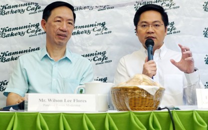 <p><strong>DOH BUDGET.</strong> Cabinet Secretary Karlo Nograles (right) attends the Pandesal Forum held at Kamuning Bakery Cafe, Kamuning, Quezon City on Tuesday (Jan. 24, 2020). Nograles said it is up to the Department of Health whether to ask for higher budget for 2021 to improve its capacity to fight diseases such as the novel coronavirus. With him is forum moderator Wilson Lee Flores.<em> (PNA photo by Ben Briones)</em></p>