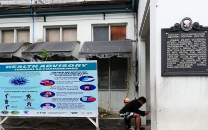 <p><strong>ADVISORY.</strong> A health advisory on the novel coronavirus is displayed outside the main building of the Corazon Locsin Montelibano Memorial Regional Hospital in Bacolod City on Wednesday (Feb. 5, 2020). The hospital's Emerging Infectious Disease Facility accommodates suspected cases of nCoV. <em>(PNA photo by Nanette L. Guadalquiver)</em></p>