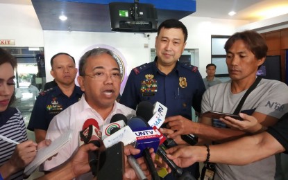 <p><strong>CONTACT TRACING.</strong> PNP-CIDG chief, Maj. Gen. Joel Coronel and DOH Epidemiology Bureau officer-in-charge, Dr. Chito Avelino, answer questions from reporters regarding the contact tracing of co-passengers of the two Chinese nationals who were confirmed cases of the 2019-nCoV, on Wednesday (Feb. 5, 2020). Coronel said so far, 50 out of the 331 passengers who were on three flights with the two Chinese nationals were accounted for and contacted. <em>(PNA photo by Lloyd Caliwan)</em></p>