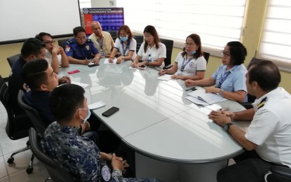 <p><strong>VESSELS FROM CHINA.</strong> Officials of various agencies, led by the Bureau of Customs Sub-port Office in Dumaguete, meet on Wednesday (Feb. 5, 2020) at the Customs Office in the city to discuss proper procedures in the boarding of three vessels from China amid the novel coronavirus threat. The vessels, one of them a tugboat with 11 Filipino crew that fly the Belize flag, arrived here Tuesday. <em>(PNA photo by Judy Flores Partlow)</em></p>