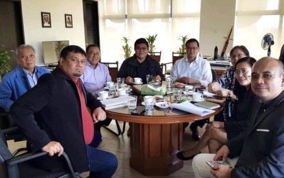 <p><strong>HOUSING FOR INFORMAL SETTLERS</strong>. Cebu City Mayor Edgardo Labella (fourth from left) sits beside Secretary Eduardo del Rosario, chairperson of the Housing and Urban Development Coordinating Council, city officials and developers, in a meeting in Makati City on Wednesday (Feb. 5, 2020). Labella announced that the Cebu City government will construct medium-rise buildings for the informal settlers. <em>(Photo courtesy of Cebu City PIO)</em></p>