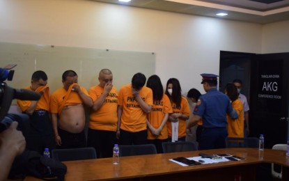 <p><strong>ARRESTED.</strong> Eight Chinese nationals were arrested for kidnapping their compatriot in Manila early on Wednesday (Feb. 5, 2020). A follow-up investigation is ongoing to determine the motive of the abduction as it was found out that the victim has no outstanding loans from the kidnappers. <em>(Photo courtesy of PNP-AKG)</em></p>