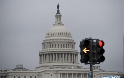 <p>ACQUITTED. The Capitol and traffic lights are seen in Washington D.C., the United States, on Feb. 5, 2020. US President Donald Trump was acquitted on Wednesday by the Senate after the chamber voted down both articles of impeachment against him that the House approved late last year. (Photo by Liu Jie/Xinhua)</p>