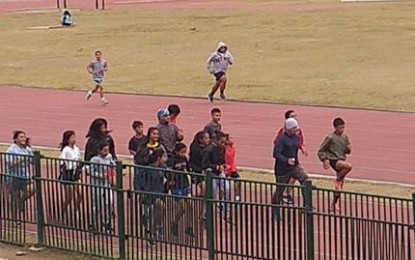 <p><strong>TRAINING CONTINUES</strong>. Student-athletes continue to train at the Baguio athletic bowl after the Cordillera Administrative Region Athletic Association meet was postponed due to the 2019 novel coronavirus (2019 nCoV) scare. The Department of Education-Cordillera slated the meet on March 24 to 28. <em>(PNA photo by Pigeon Lobien)</em></p>