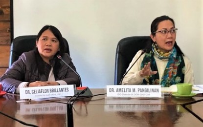 <p><strong>FOUR PUIs.</strong> Department of Health-Cordillera Administrative Region officer in charge, Dr. Amelita Pangilinan (right) briefs the media on Friday of the updates on the 2019 novel coronavirus situation in the region, saying there are now four PUIs who are in isolation in medical facilities. Also in the photo is assistant city health services officer, Dr. Celia Flor Brillantes. <em>(PNA photo by Corwin Lucas Golonan)</em></p>