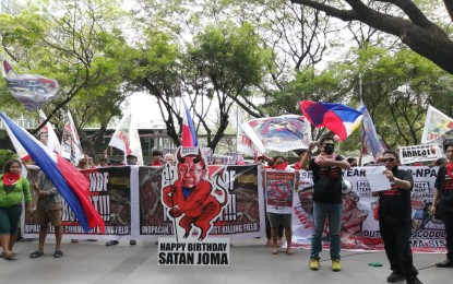 <p><strong>'RETURN JOMA'.</strong> Anti-communist groups stage a protest in front of the Dutch Embassy in Makati City on Feb. 7, 2020 to denounce the violence and atrocities committed by the Communist Party of the Philippines-New People’s Army-National Democratic Front (CPP-NPA-NDF) and its allies. On the occasion of CPP-NPA-NDF founder Jose Maria Sison's 81st birthday on Friday, the groups also asked the Dutch government to stop harboring the CPP leader and cancel his asylum status in the Netherlands. <em>(PNA photo by Lade Kabagani)</em></p>