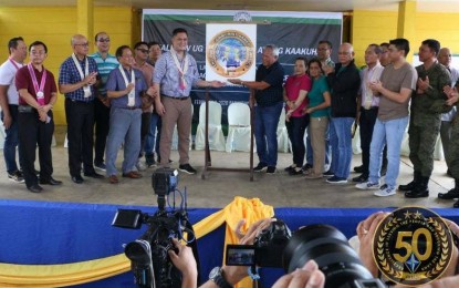 <p><strong>ENDING INSURGENCY.</strong> Sec. Martin Andanar (center left), head of the Presidential Communications Operations Office, joins Cagayan de Oro City Mayor Oscar Moreno (center right), during the inauguration of the Cagayan de Oro City Task Force to End Local Communist Armed Conflict (CDOCTF-ELCAC) Friday (Feb. 7, 2020). The activity also highlights the inauguration of newly-paved and opened roads, groundbreaking of the Oro Kalandang (Kalinaw) Center, a half-way house for the former rebels, awarding of cash for the firearms remuneration of the former rebels and turnover of one tractor to the 65th Infantry Battalion intended for the Community Support Program. <em>(Photo courtesy of 4th Infantry Division, Philippine Army)</em></p>