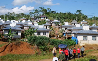 <p><strong>HOUSING UNITS FOR IPS</strong>. Photo of decent housing units turned over to the residents of indigenous peoples (IPs) communities through the PAyapa at MAsaganang PamayaNAn (PAMANA) program on February 4, 2020. The 300 housing units were built through the Department of Social Welfare and Development’s Modified Shelter Assistance Program. <em>(Photo courtesy of OPAPP)</em></p>