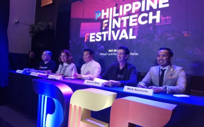 <div><strong>FINTECH FEST</strong>. Union Bank of the Philippines president Edwin Bautista (left), TeamAsia President Monette Hamlin (2nd left), Department of Information and Communications Technology Undersecretary Jose Arturo De Castro (3rd left), and Fintech Philippines Association (FPH) chair Justo Ortiz, sign a memorandum of agreement for the staging of the Philippine Fintech Festival 2020 Monday (Feb. 10, 2020) in Taguig City. The festival, set on May 20-21, will gather technology and innovation experts and business executives to explore fintech potentials in the country. (<em>PNA photo by Cristina Arayata</em>) </div>