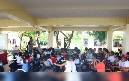 <p><strong>INFO ON NCOV. </strong>Learners of Sagkahan Elementary School in Tacloban City attend a lecture on the 2019 novel coronavirus acute respiratory disease (2019-nCoV ARD) on Feb. 5, 2020. The Department of Health (DOH) has enhanced its communication and information drive about the global outbreak by doing lectures in government offices, schools, and establishments. <em>(Photo courtesy of DOH)</em></p>