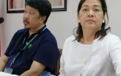 <p>Dr. Cerelyn Pinili, head of the Davao City Veterinarian’s Office (right).<em> (PNA file photo by Che Palicte)</em></p>