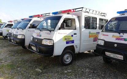 <p><strong>MOBILITY.</strong> Governor Eleanor Bulut-Begtang distributes 57 patrol cars to 57 barangays in the seven towns of Apayao on Thursday (Feb. 13, 2020). The vehicles are primarily intended for barangay patrol and transport people during emergencies and calamities. <em>(PNA photo by Liza T. Agoot)</em></p>
