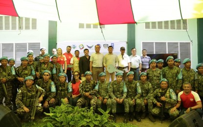 <p><strong>JPST BARRACKS.</strong> Officials and members of the Joint Peace and Security Team (JPST) pose after the official turnover of the first of 11 JPST barracks to the Joint Peace and Security Committee at Camp Abubakar, Barira, Maguindanao on Feb. 12, 2020. The facility will serve as headquarters of the JPST team tasked to secure the decommissioned weapons. <em>(Photo courtesy of OPAPP)</em></p>